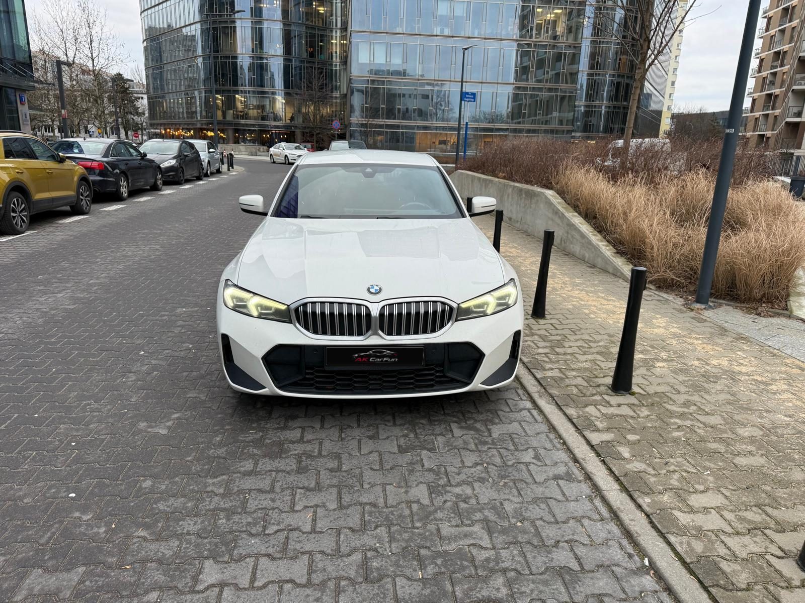 Przód BMW 318i G20 2023 z tablicą AK CarFun
